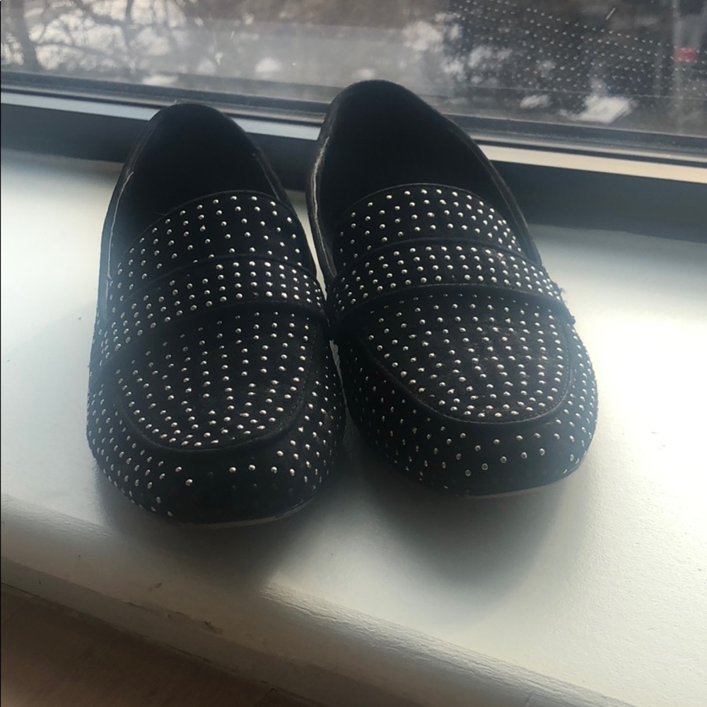 Also black loafers with metallic studs